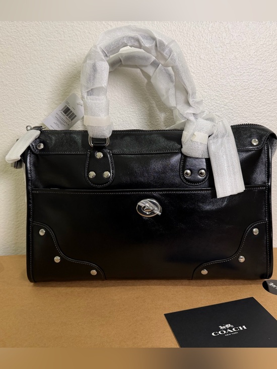 Coach Handbags - NWT Coach Rhyder 38 in Black Leather